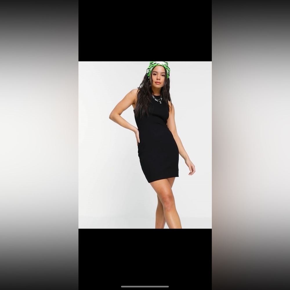 Bershka Ribbed Racer Mini Dress in black.